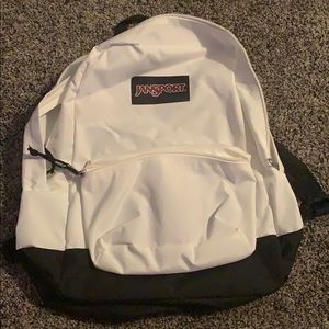 White Jansport backpack